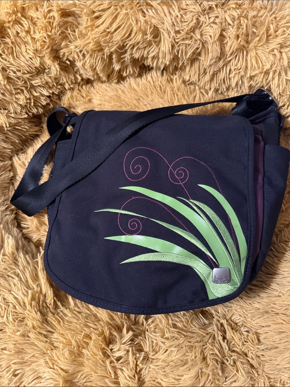 Haiku Black Crossbody Bag with Green Leaf Accent